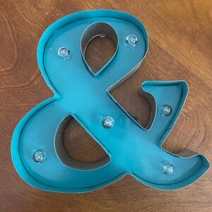 Light up & ampersand sign by apothecary